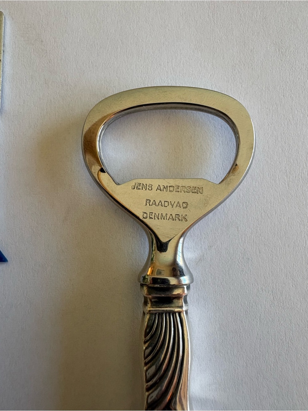 Polished Silver Bottle Opener with Decorative Handle